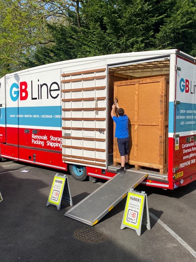 A GB Liners moving van is loaded with items for storage